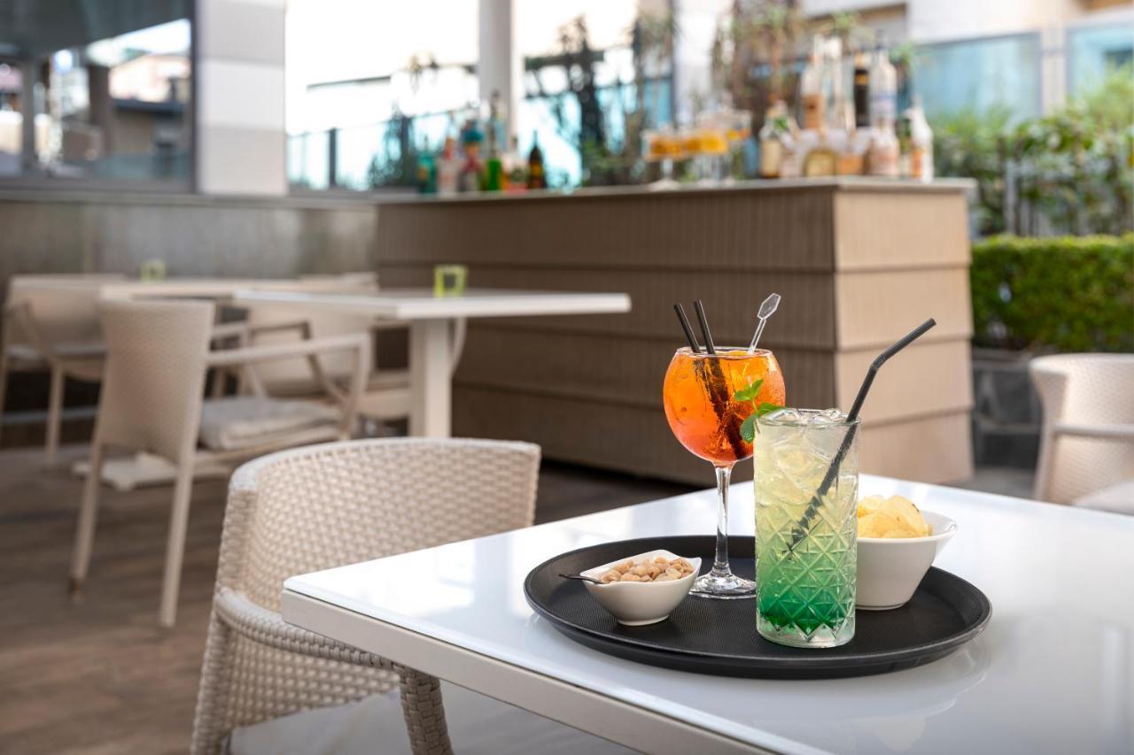 Lhp Hotel Santa Margherita Palace & Spa Santa Margherita Ligure Bagian luar foto Cocktails at the Sky Bar